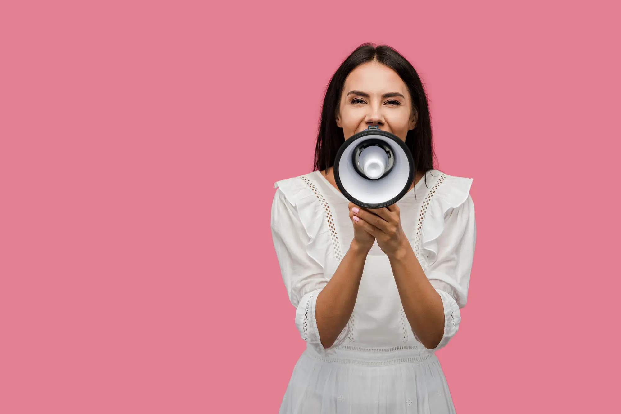 women holding speakerphone
