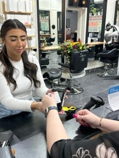 person tapping their credit card